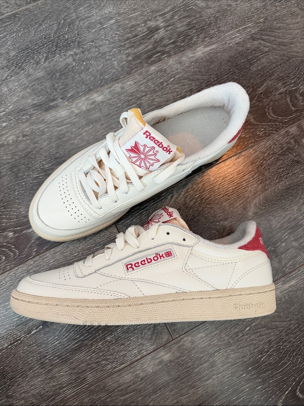 Reebok Unisex White Sneakers with Red Accents